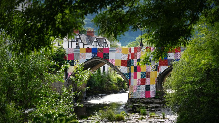 Bridges, Not Walls installation by Luke Jerram cover Llangollen Bridge, Denbighshire.
