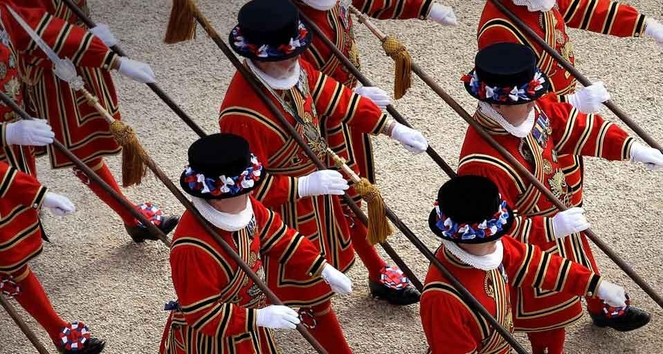 The Queen’s Body Guard of the Yeomen of the Guard march in the gardens of Buckingham Palace in London, England