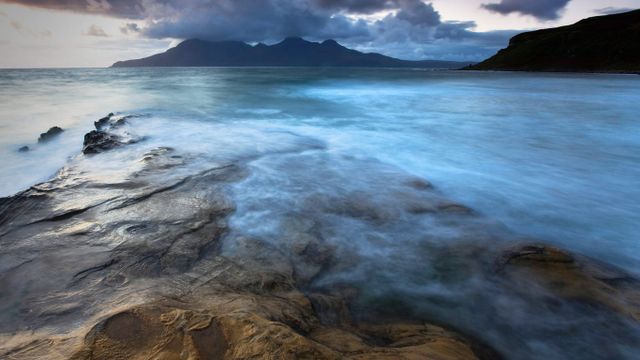 View towards Isle of Rum from Isle of Eigg in the Scottish Inner Hebrides 
