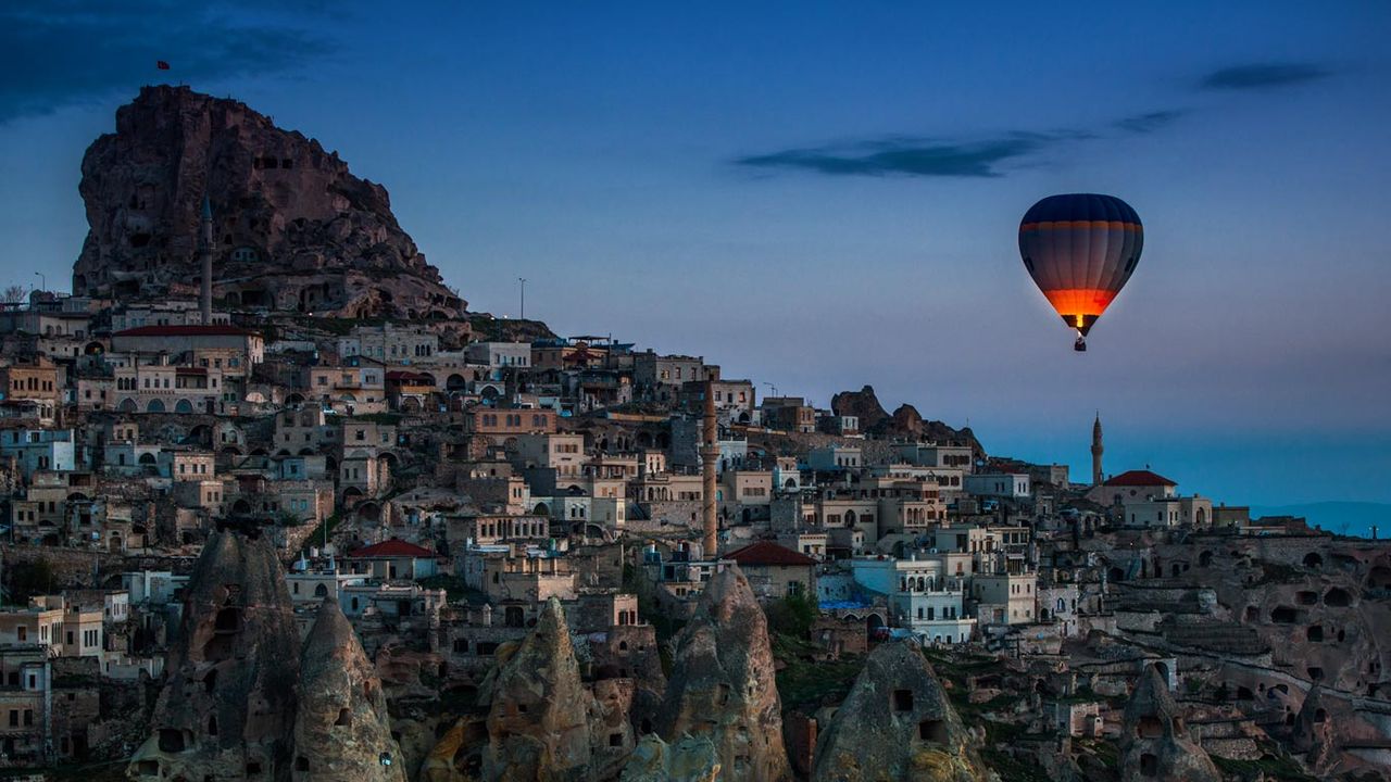 Hot air balloon over Uçhisar in Cappadocia, Turkey