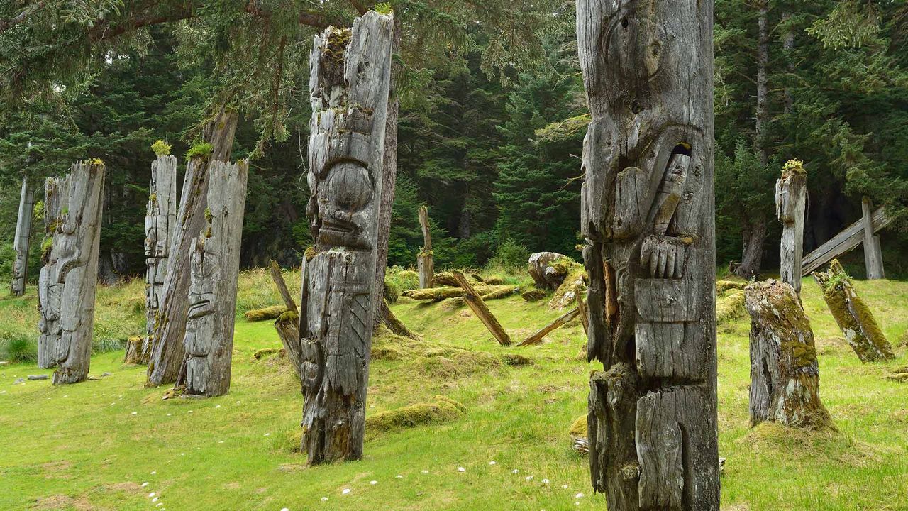 Mortuary poles containing remains of high status people 