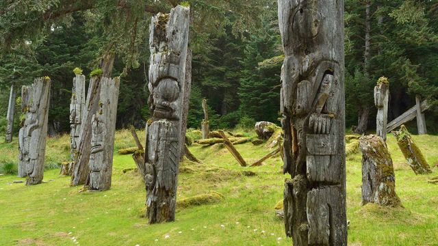 Mortuary poles containing remains of high status people 