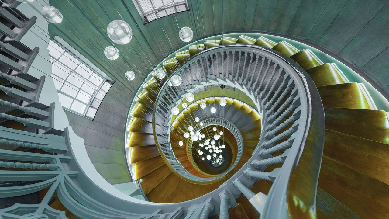 Cecil Brewer spiral staircase at Heal's furniture store, Tottenham Court Road, London
