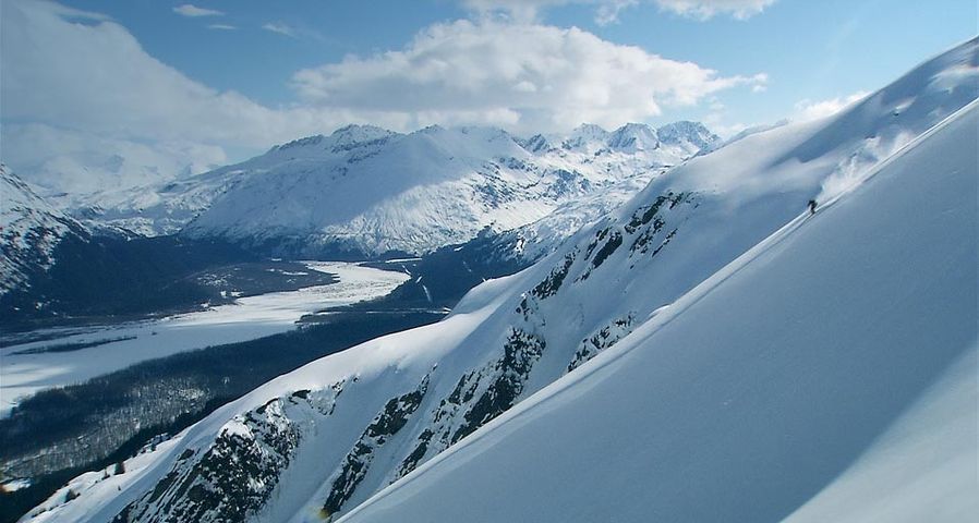 Skier making turns on a ridge near Valdez, Alaska
