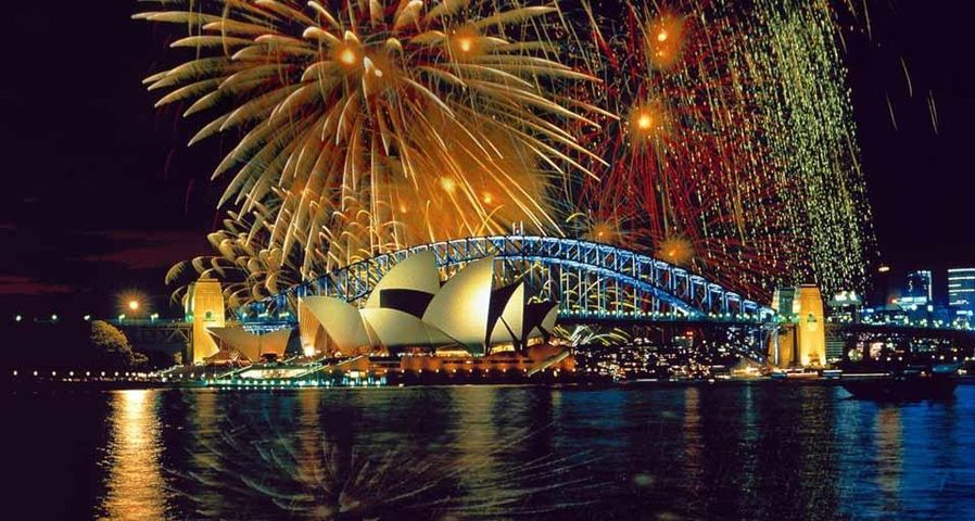 Australia.  New South Wales, NSW.  Sydney.  Sydney Opera House, Sydney Harbour Bridge.  New Years Eve fireworks display