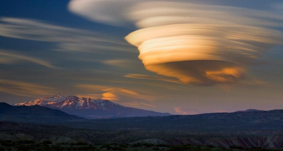 Lenticular cloud over extinct volcano at sunset, Patagonia, Argentina