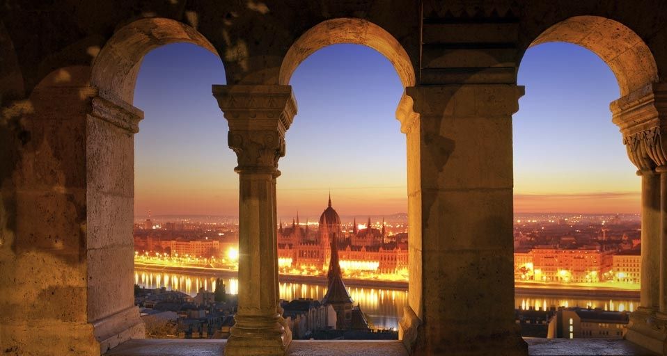 Parliament by night along the Fisherman's Bastion in Budapest, Hungary