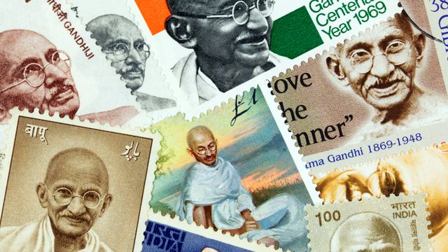 An assortment of postage stamps with images of Mahatma Gandhi