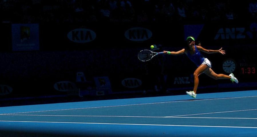 MELBOURNE, AUSTRALIA - JANUARY 24: Victoria Azarenka of Belarus plays during day nine of the 2012 Australian Open at Melbourne Park on January 24, 2012 in Melbourne, Australia.
