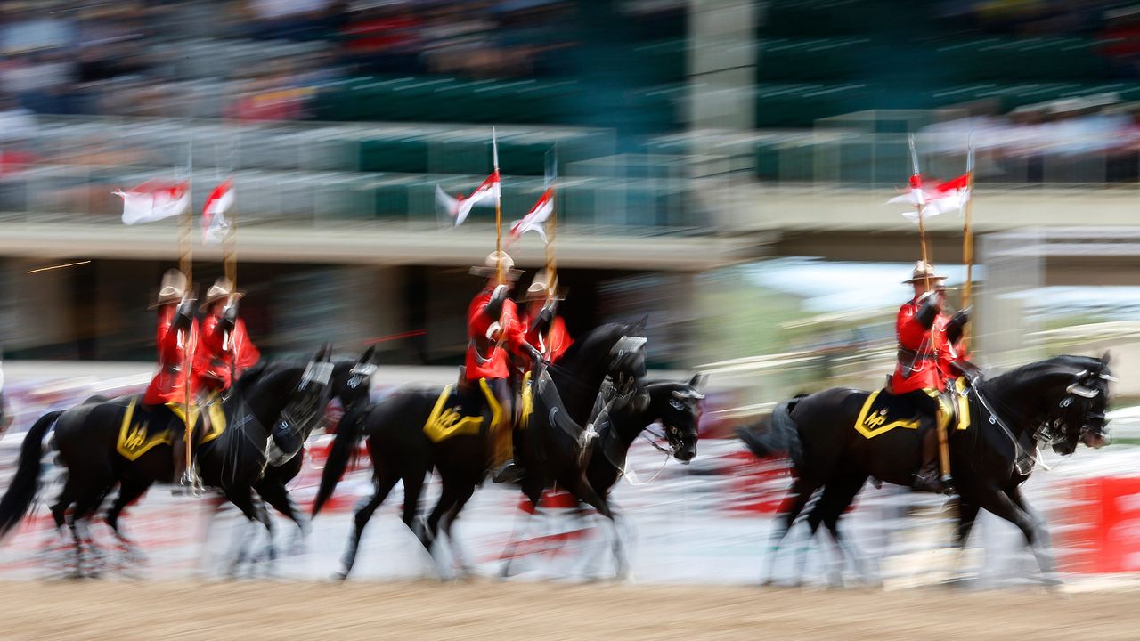 The Royal Canadian Mounted Police Musical Ride at the Calgary Stampede Rodeo in Calgary 