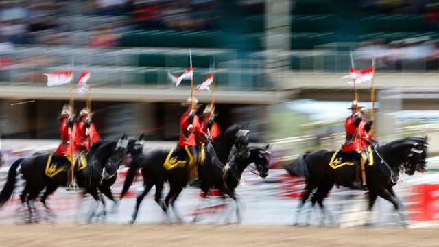 The Royal Canadian Mounted Police Musical Ride at the Calgary Stampede Rodeo in Calgary 