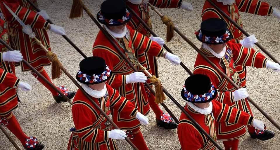 The Queen’s Body Guard of the Yeoman of the Guard march in the gardens of Buckingham Palace in London, England