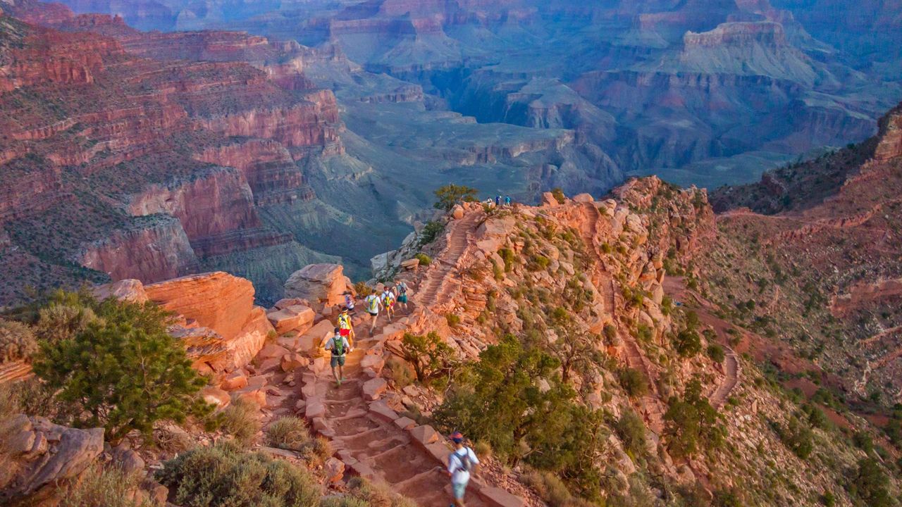 Runners on South Kaibab Trail in the Grand Canyon, Arizona, USA 