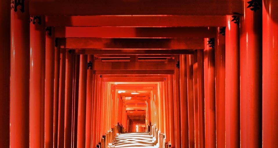 Pathway of torii gates at Fushimi Inari Shrine in Kyoto, Japan