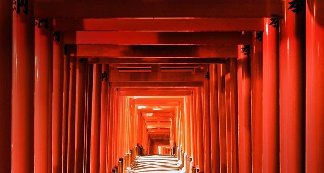 Pathway of torii gates at Fushimi Inari Shrine in Kyoto, Japan