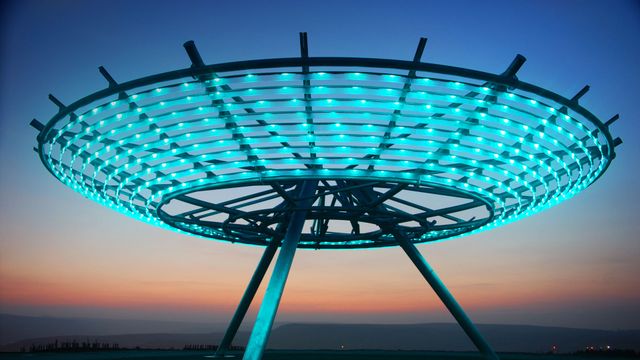 Illuminated sculpture 'Halo' above Haslingden in Lancashire 