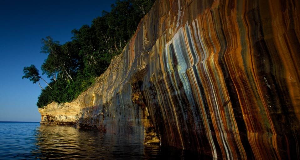 Stained rocks and trees, Rocks National Lakeshore, Munising, Michigan