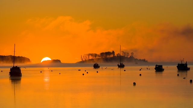 Silhouettes of fishing boats in Mahone Bay, Nova Scotia 