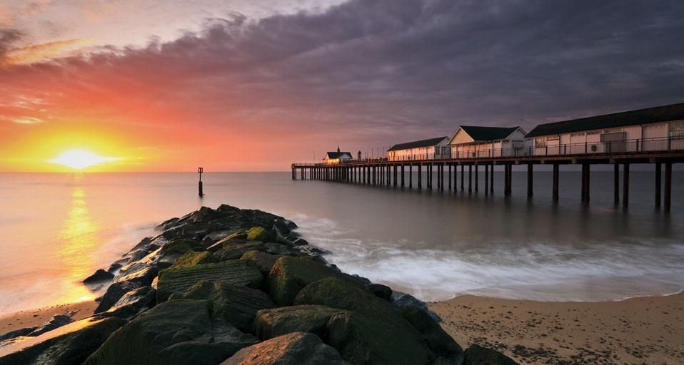 Dawn sunlight on Southwold pier, Suffolk, England