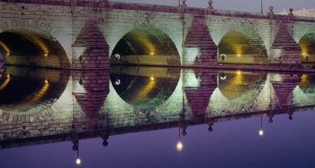 Segovia Bridge at night in Madrid, Spain