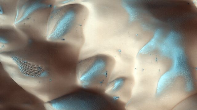 Frost-covered dunes on the surface of Mars
