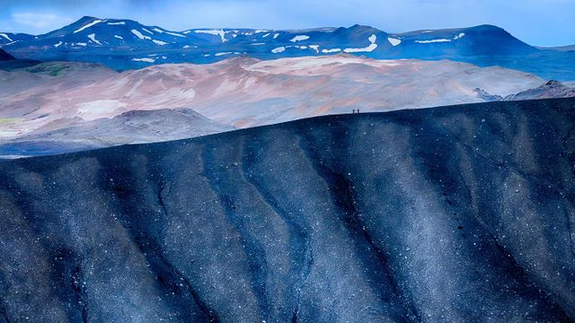 Hikers on Hverfjall, Iceland