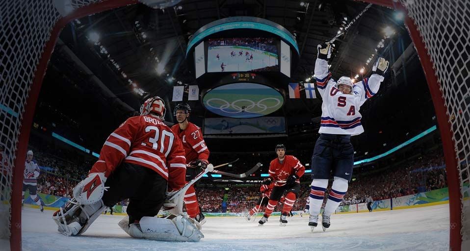 Team USA celebrates after Brian Rafalski  scores past goalkeeper Martin Brodeur of Canada during their Men’s Ice Hockey preliminary game at the Vancouver 2010 Winter Olympics on 21 February 2010 - Bruce Bennett/Getty Images ©