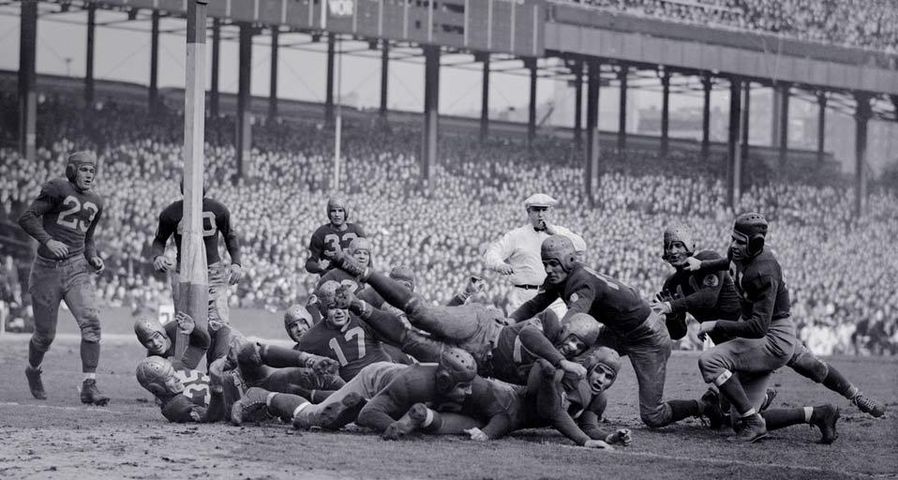 Historical photo of a 1937 football game between the Washington Redskins and the New York Giants at the Polo Grounds, New York City