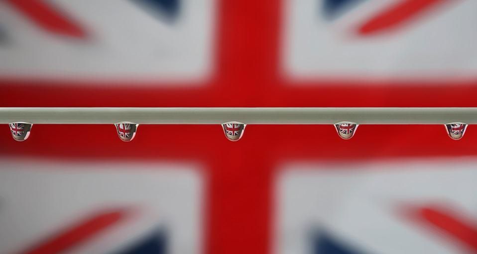 Raindrops reflected against a Union Jack flag