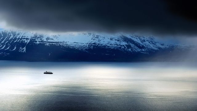 A ferry passes the Lyngen Alps in Norway