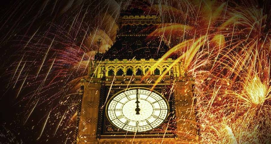 England, London, Big Ben surrounded by fireworks at night