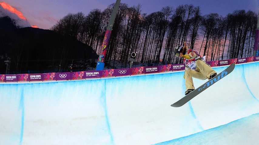 Kaitlyn Farrington of the United States competes in the Women's Snowboard Halfpipe at the 2014 Winter Olympics on February 12, 2014, in Krasnaya Polyana, Russia