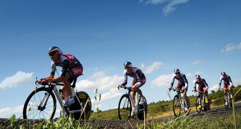 Belgian cycling team leader Cadel Evans of Australia rides with teammates in the 2009 Tour de France cycling race