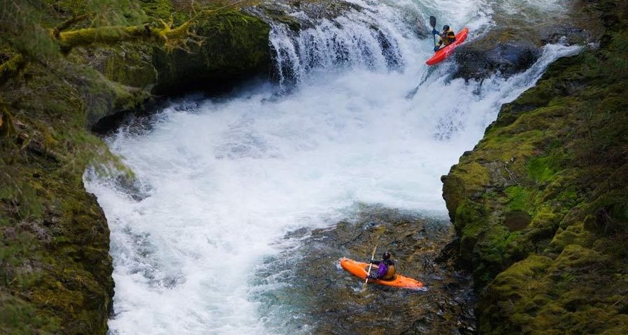 Kayakers on Eagle Creek in the Columbia River Gorge, Oregon, USA