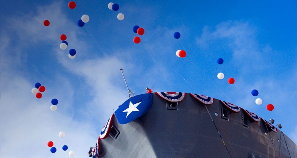 USNS Washington Chambers (T-AKE 11) decorated for christening and launch, San Diego, California