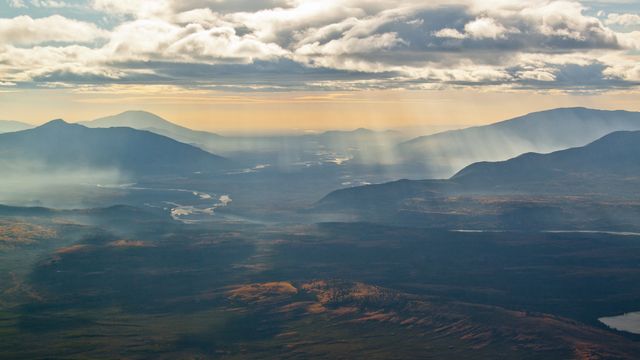 The Jackknife Mountains and river valley viewed from an airplane in NWT 