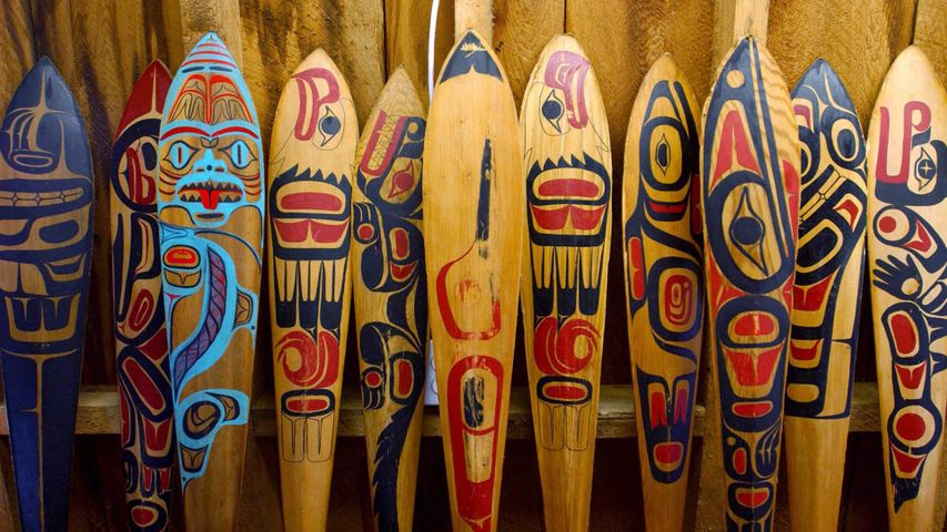 Paddles painted with family crests stand in the Haida village of Skidegate, B.C. 