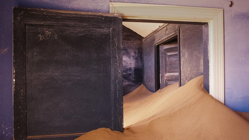 Abandoned house filled with drifting sand, Kolmanskop, Namibia