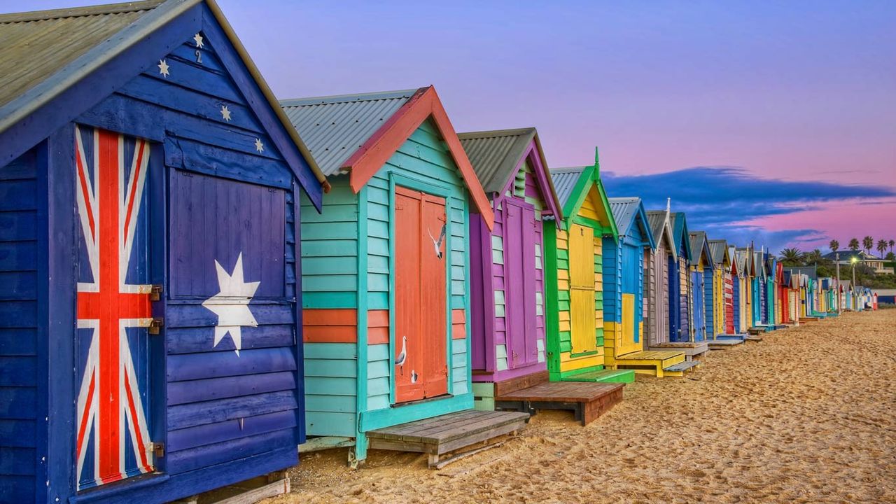 Bathing boxes line the beach at Brighton, Victoria, Australia