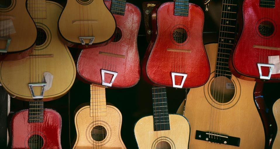 Guitars hanging on a wall