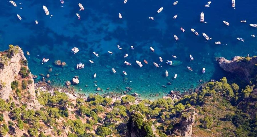 Aerial view of boats in the Tyrrhenian Sea, off the coast of Capri, Italy