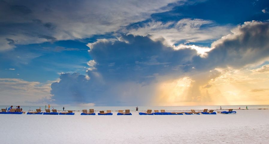 Chairs line the beach in St. Petersburg, Florida, USA