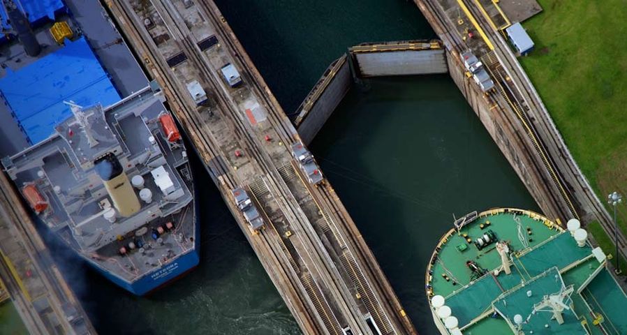 Aerial of two vessels during maneuvers in Gatun Locks, Panama Canal