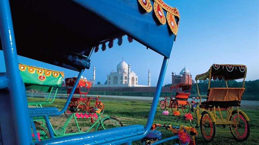 Rickshaws and view of Taj Mahal in Agra, India