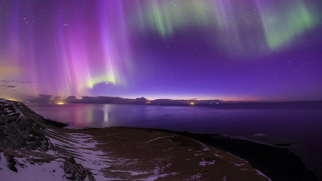 Aurora Borealis over the coast of Iceland