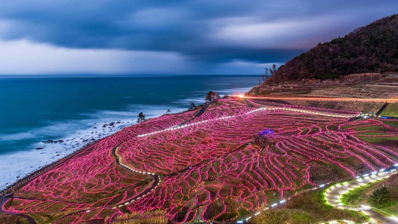 Rice terraces strung with lights, Wajima, Japan 