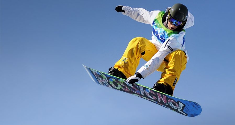 Torah Bright of Australia gets airborne during a training session of the Women's Snowboard Halfpipe event at the Vancouver Winter Olympics on February 18, 2010 – Martin Bureau/AFP/Getty Images ©