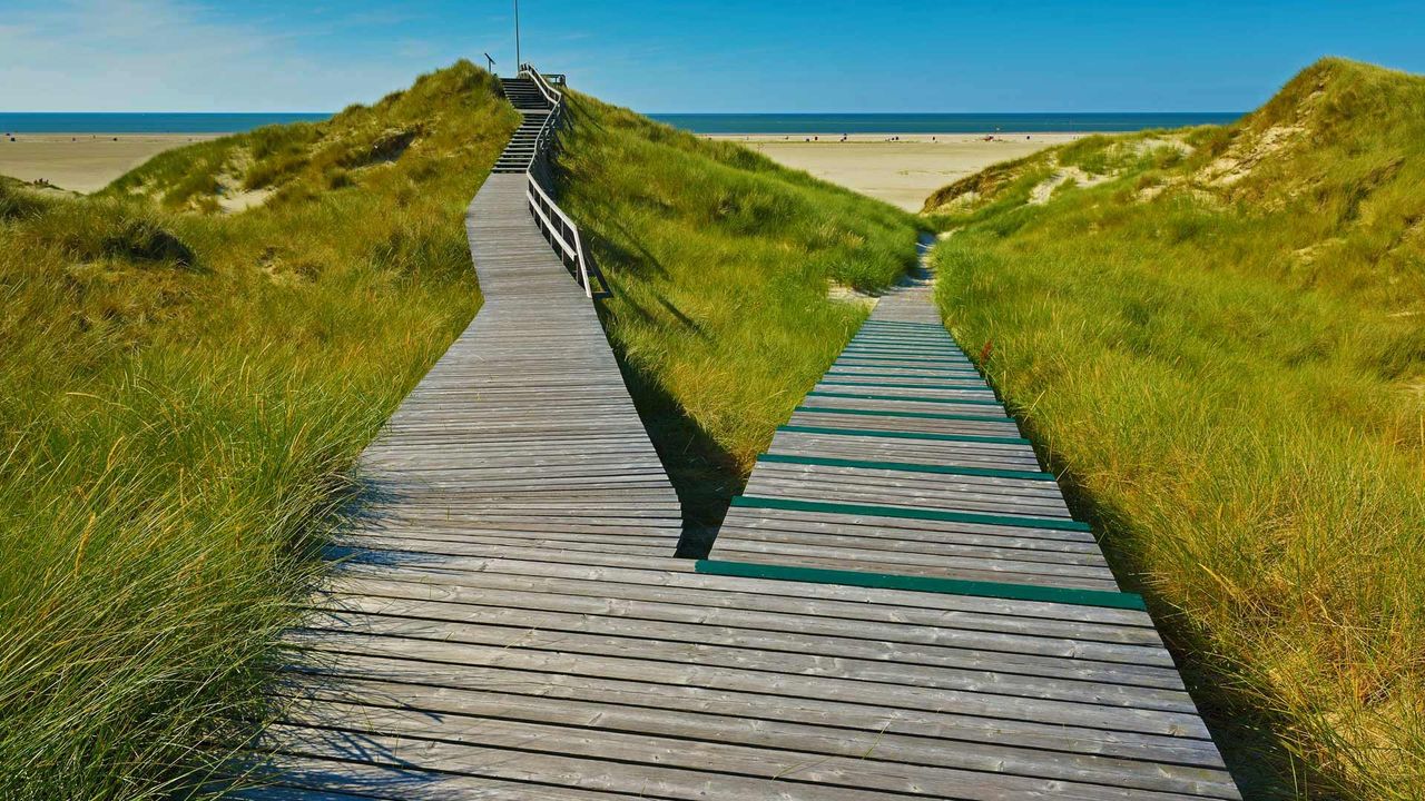 A boardwalk in Norddorf on Amrum Island, Germany 