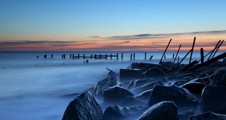 Sea walls built off the coast of Happisburgh, England