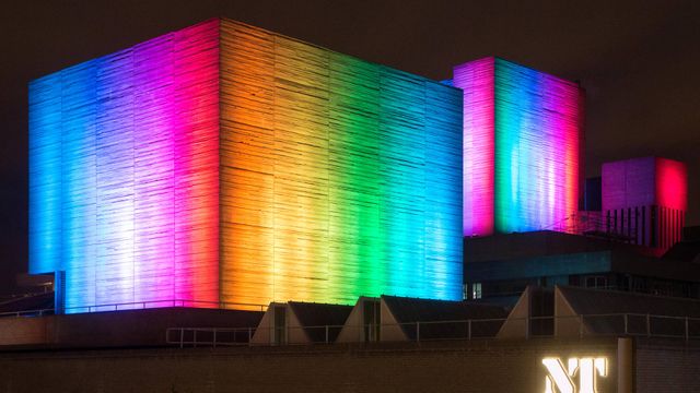 The National Theatre lit up in rainbow colours, London 